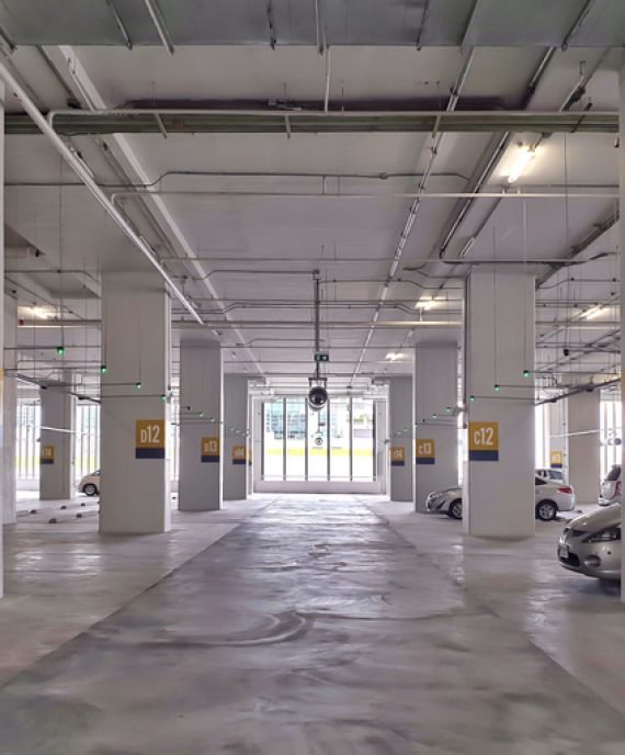 Indoor car parking in shopping center with empty space